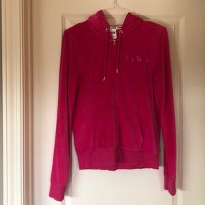 Victoria’s Secret sweatshirt.